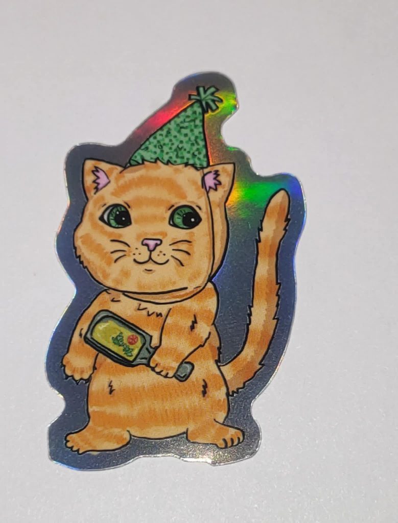 Silvesterkatze: Rote Katze mit Raclette-Pfännchen-Holo-Sticker