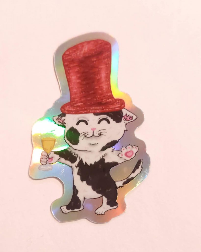 Silvesterkatze: Schwarz-weiße Katze mit Zylinder und Sektglas-Holo-Sticker