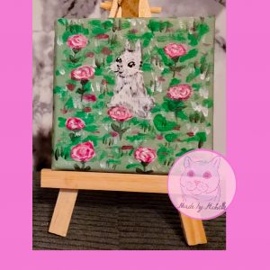 Miniaturbild Kaninchen im Rosenfeld