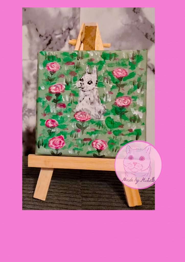 Miniaturbild Kaninchen im Rosenfeld