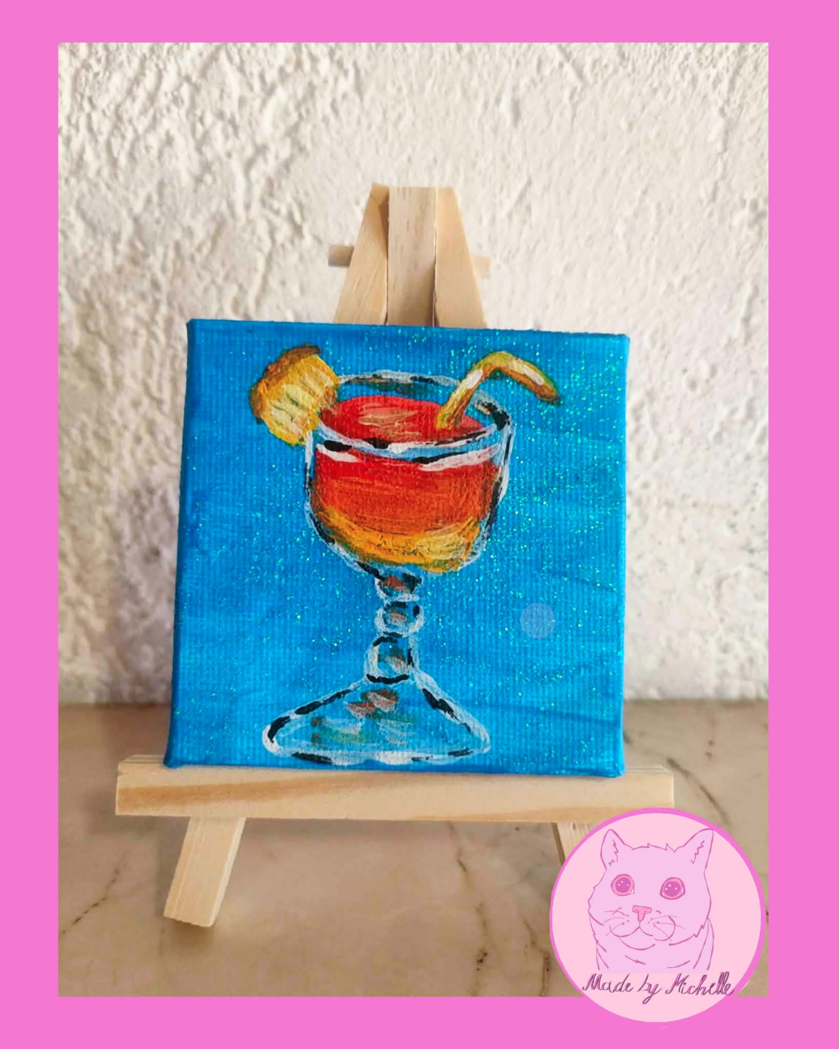 Tequila Sunrise auf blauem Glitzerhintergrund